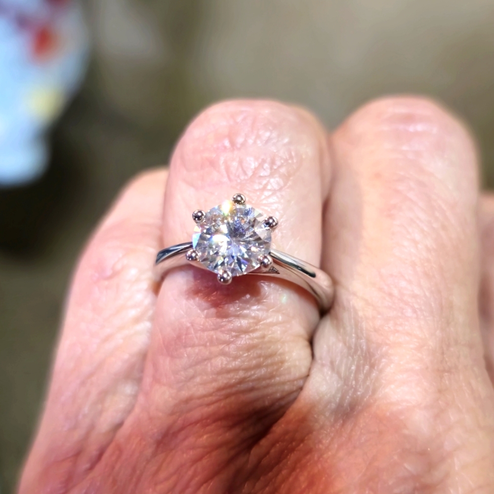 !!! SOLD !!!(1) Doveggs 2 carat round solitaire in a sterling silver ring .